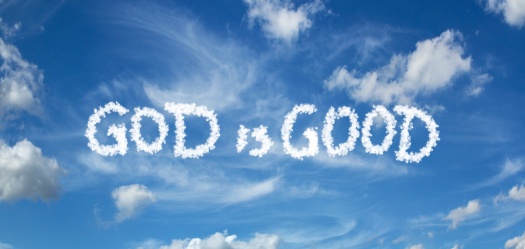 GOD is GOOD inscription on a blue sky with clouds